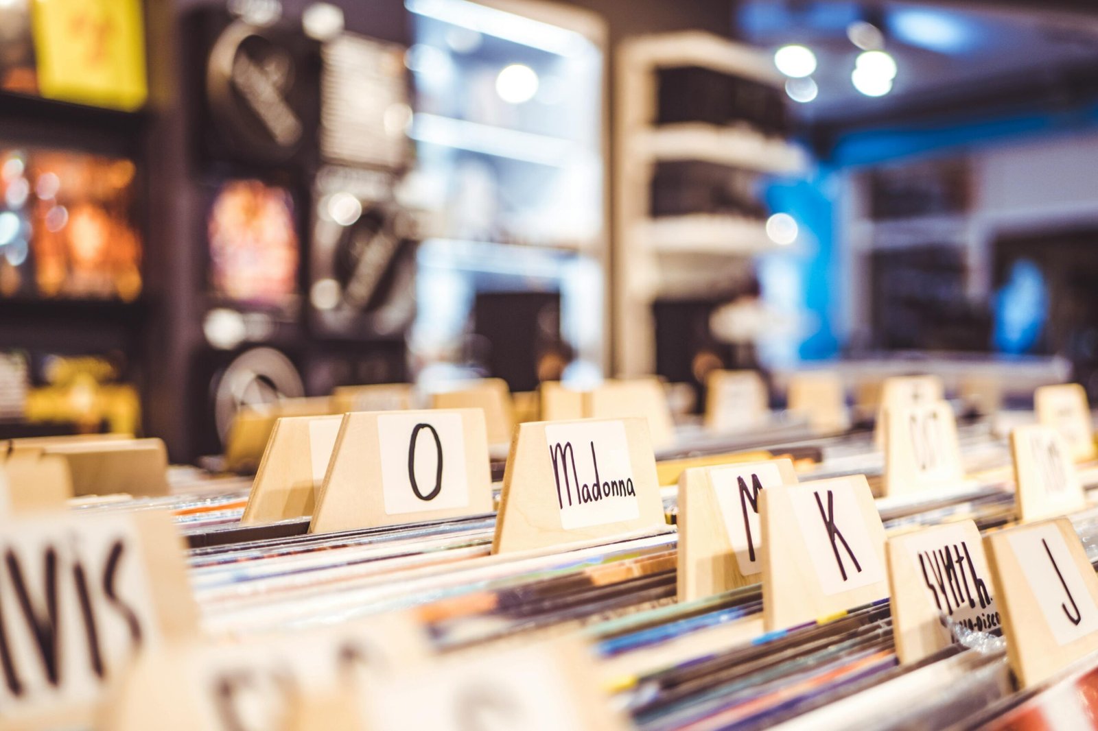About Close-up of vinyl records organized alphabetically in a music store.